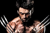 Hugh Jackman bearing his claws as Wolverine.