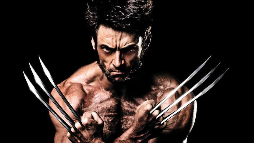 Hugh Jackman bearing his claws as Wolverine.