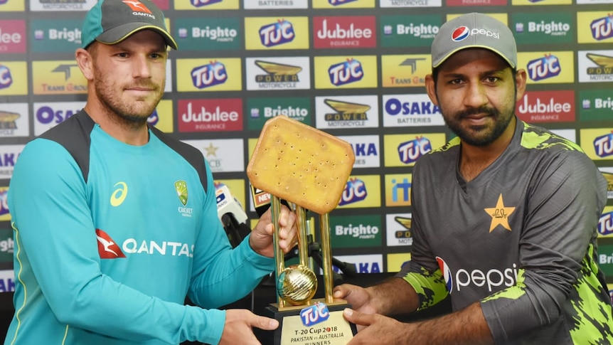 Australia and Pakistan captains pose with Tuc Trophy
