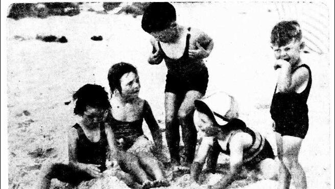 Children seek relief from the heat at Cottesloe beach in 1933