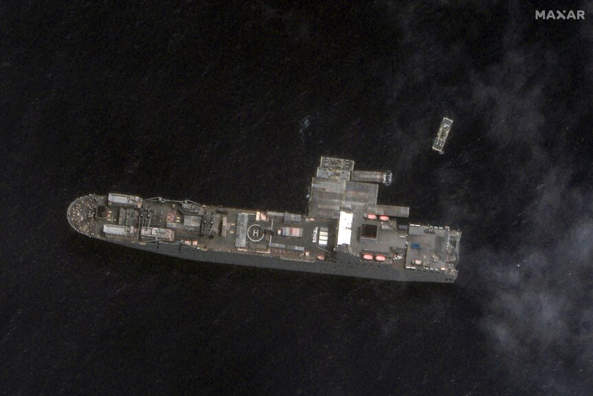 A birds eye view of a large ship in water 