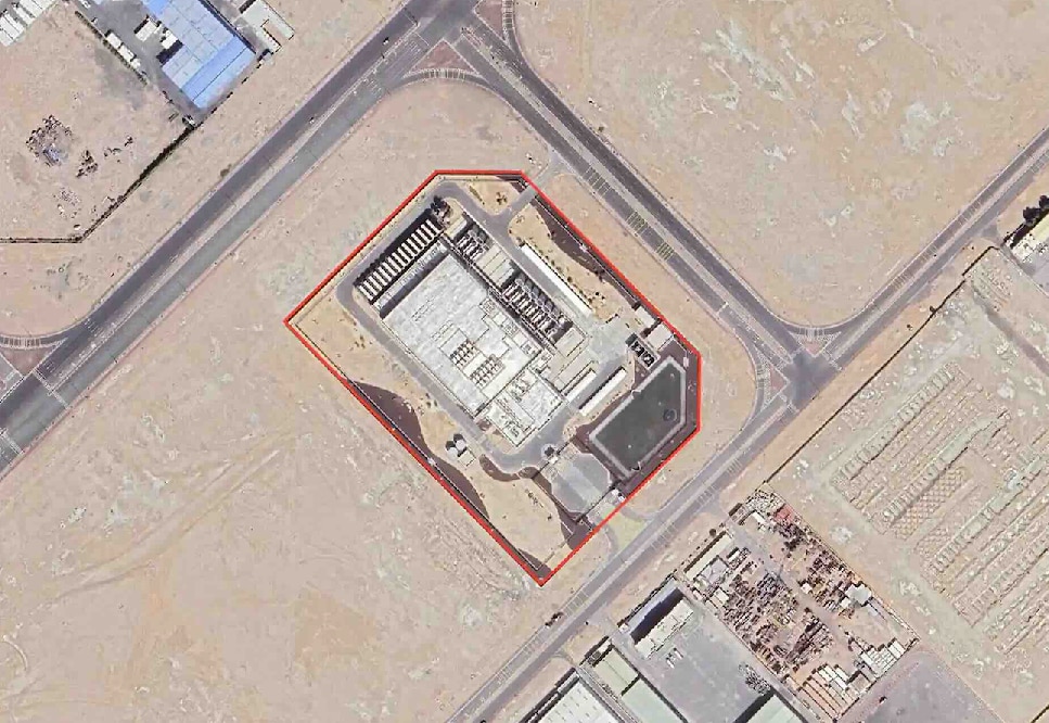 A satellite image of a data centre in a desert-like area