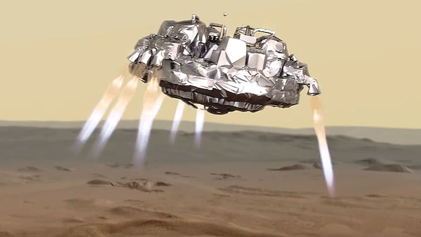 An artist's view shows Schiaparelli using its thrusters to make a soft landing on Mars