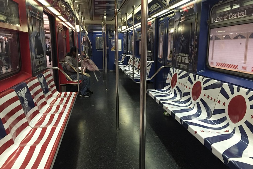 Subway train seat covered in Nazi-like symbols