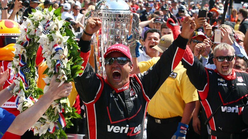 Juan Pablo Montoya celebrates Indy500 win