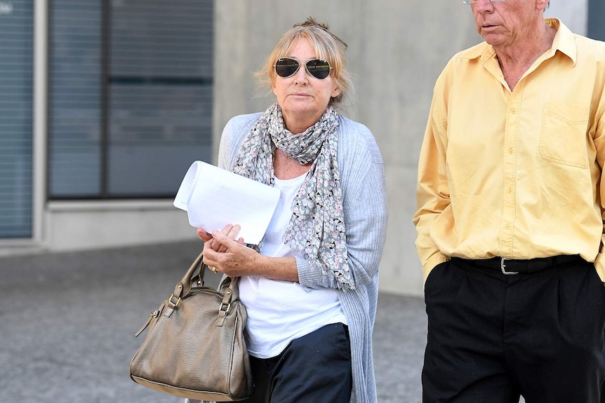 Lynette Lucas, wearing dark sunglasses, leaves the Supreme Court in Brisbane on September 17, 2018.