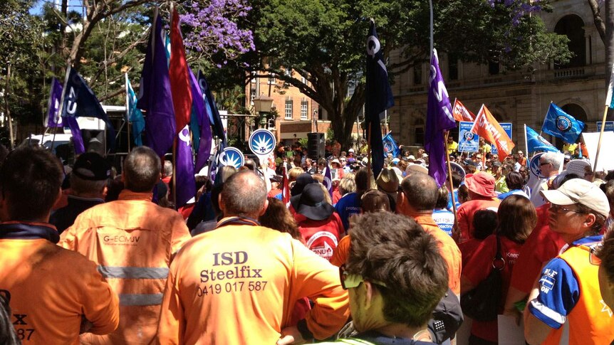Hundreds rally outside Parliament House in Brisbane over changes to workers compensation laws on October 17, 2013.