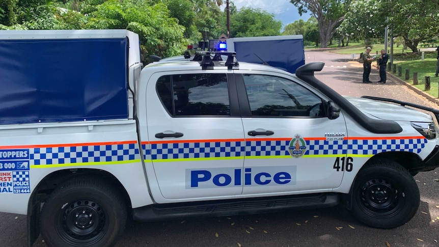 A police car blocks a road near Darwin