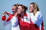 First gold ... Jodie Stimpson (C) celebrates alongside Kirsten Sweetland (L) and Vicky Holland