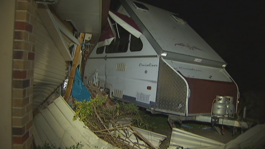 A 4WD has crashed into a house at Bray Park