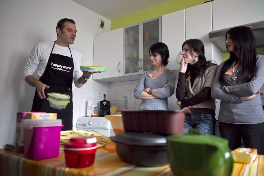 A modern Tupperware party in a kitchen in France. 