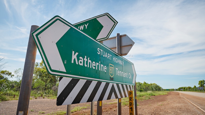 Road signage on the side of a highway intersection in the Northern Territory. 