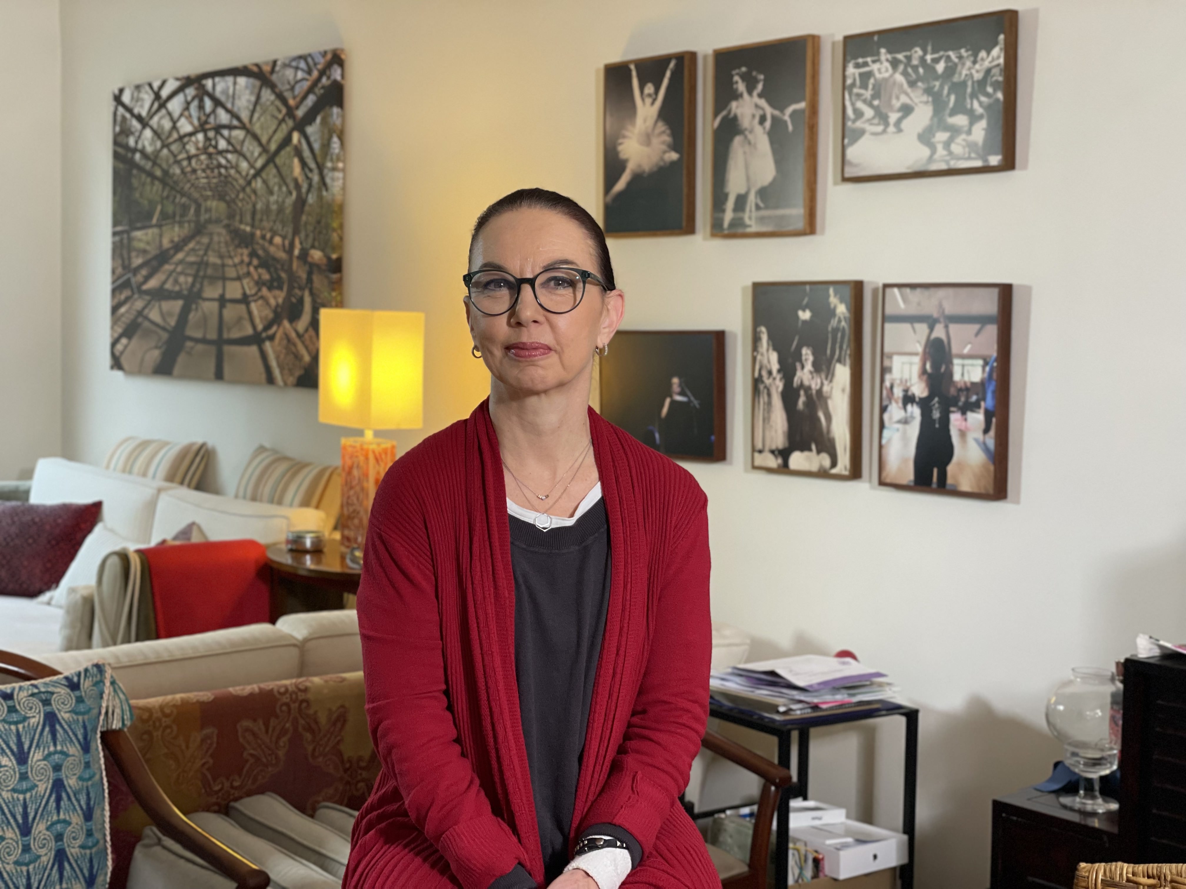 A woman sitting in a house.