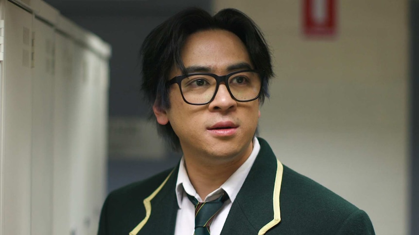 A shot of Michael Hing in a school blazer for the parody trailer The Hing Diaries