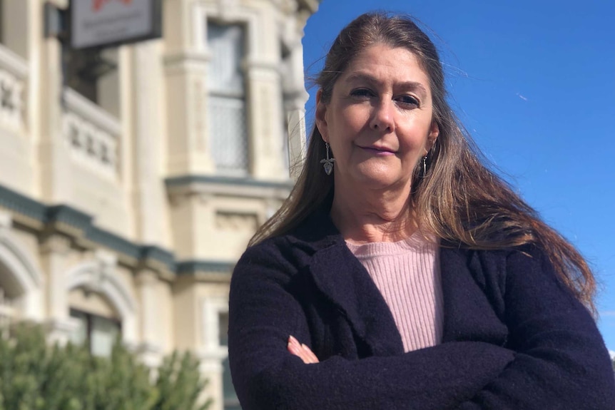 Stephanie Kirkman Meikle stands outside Bethlehem house