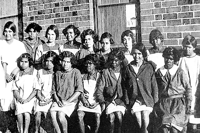 Eunice Grant, pictured in the back row, sixth from the left.