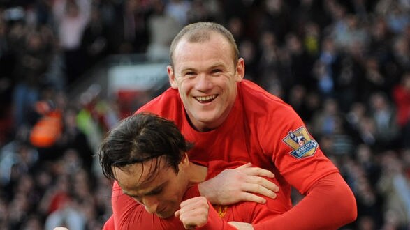 Rooney congratulates Berbatov