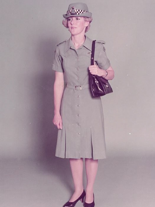 Jennifer Milligan models the female officer's uniform in 1983.