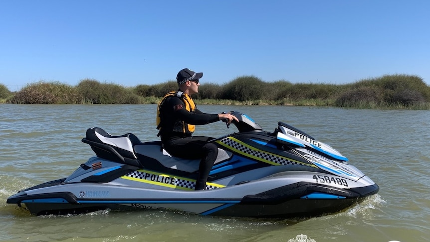 A police officer on a jet ski on Lake Alexandrina at Milang.