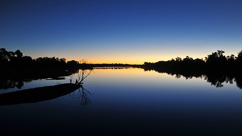 The sun sets over the Gilbert River in North Queensland