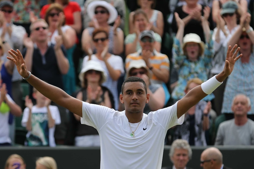 Australia's Nick Kyrgios celebrates beating France's Richard Gasquet at Wimbledon 2014.