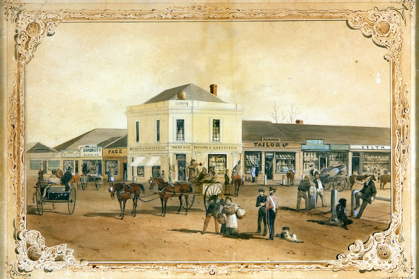 A detailed colonial painting of buildings, horses and people on the intersection of two dirt roads 