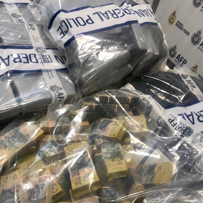 Drugs and cash seized by police during raids in Melbourne.