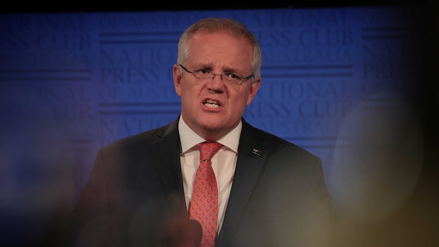 Morrison speaks with a pained look on his face