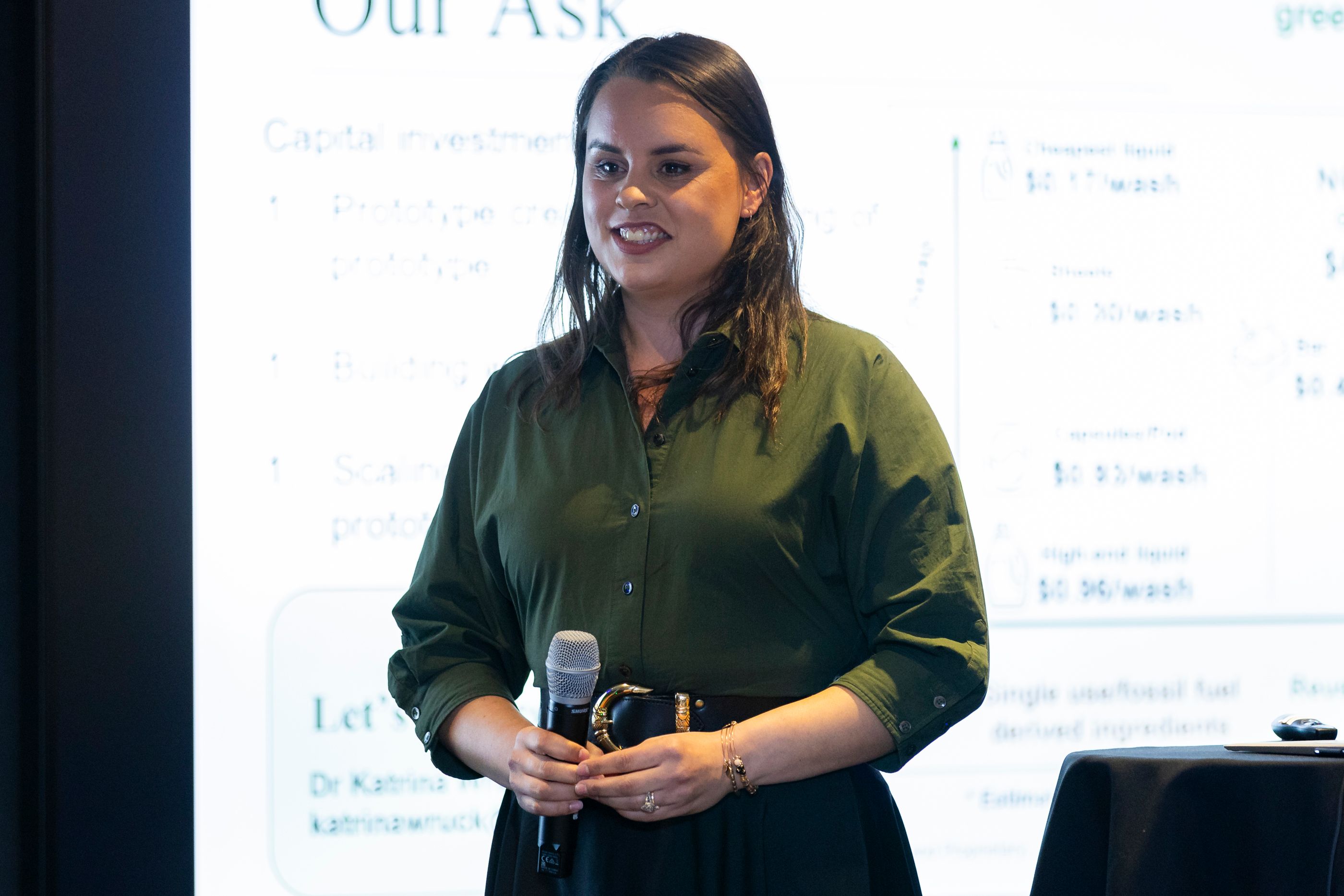 A woman standing with her hands crossed