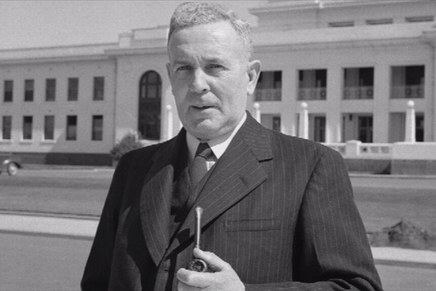 Ben Chifley stand in front of Parliament House