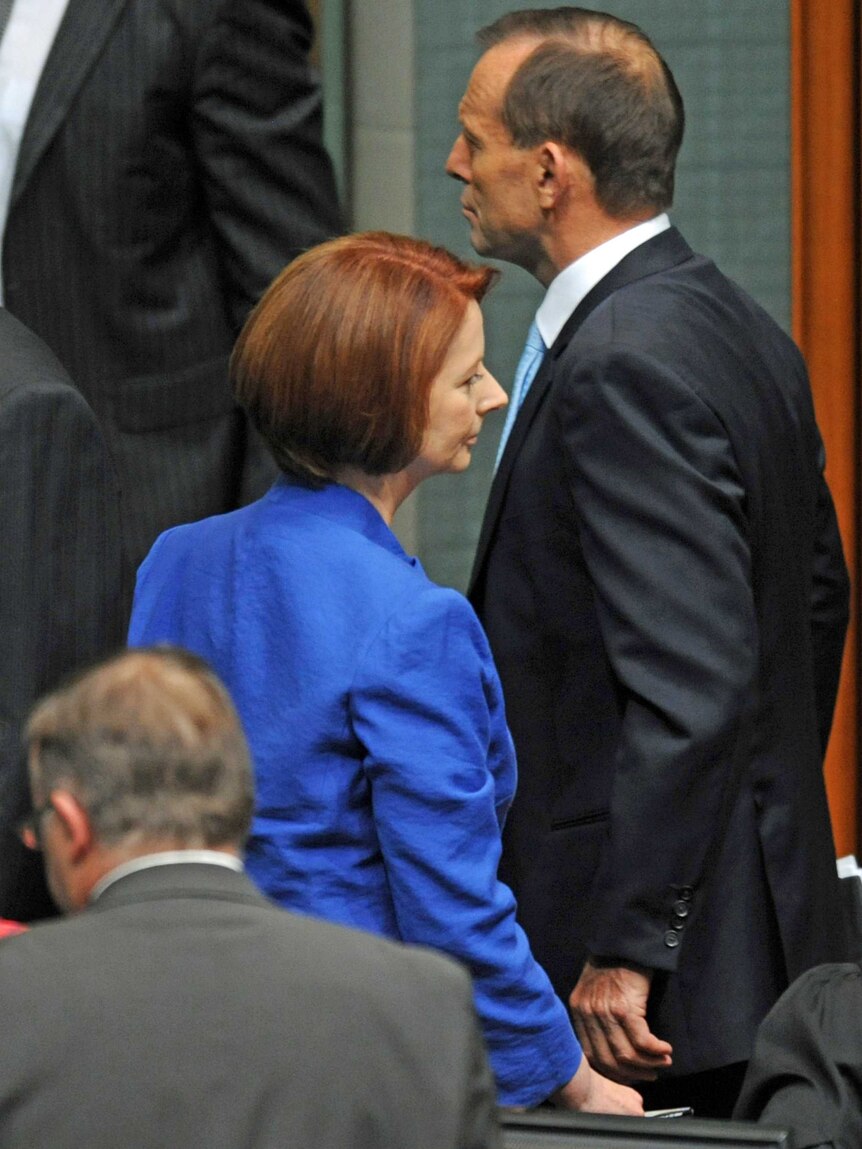 Julia Gillard and Tony Abbott during Question Time on October 9, 2012.