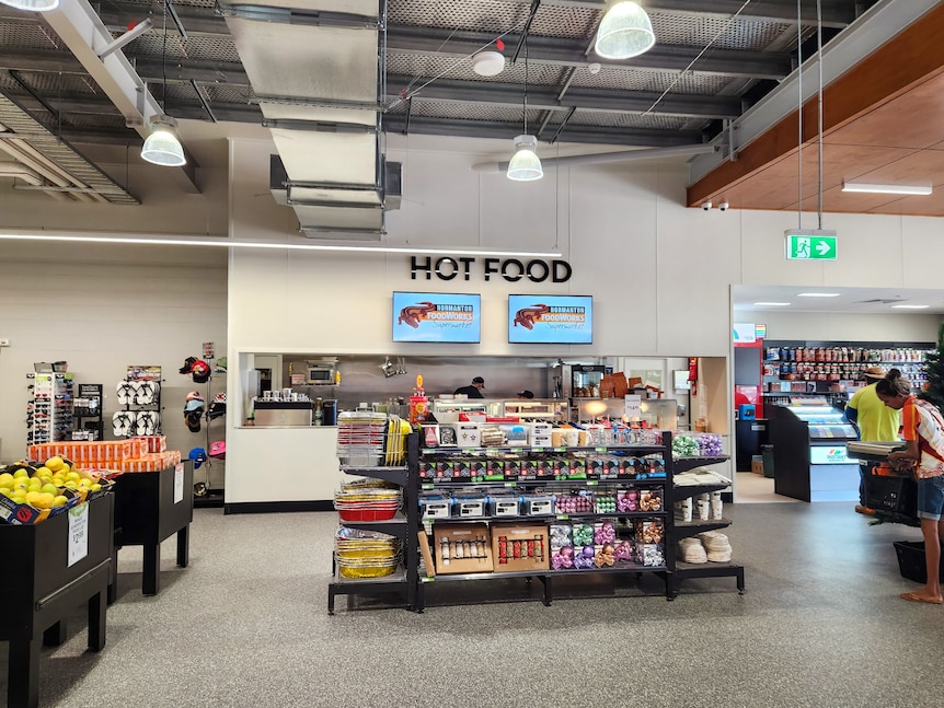 A hot food counter inside a grocery store