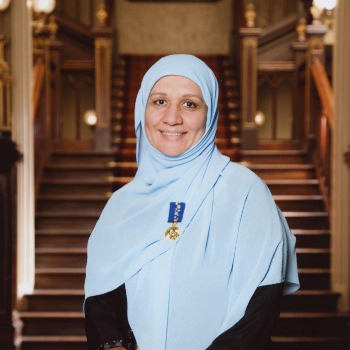 Mahboba Rawi with her medal of the Order of Australia.