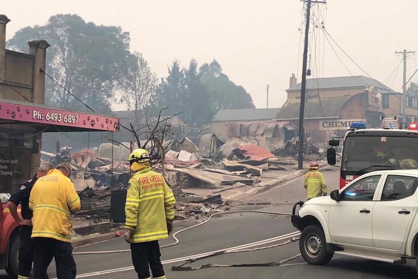 Several razed buildings along the main street.