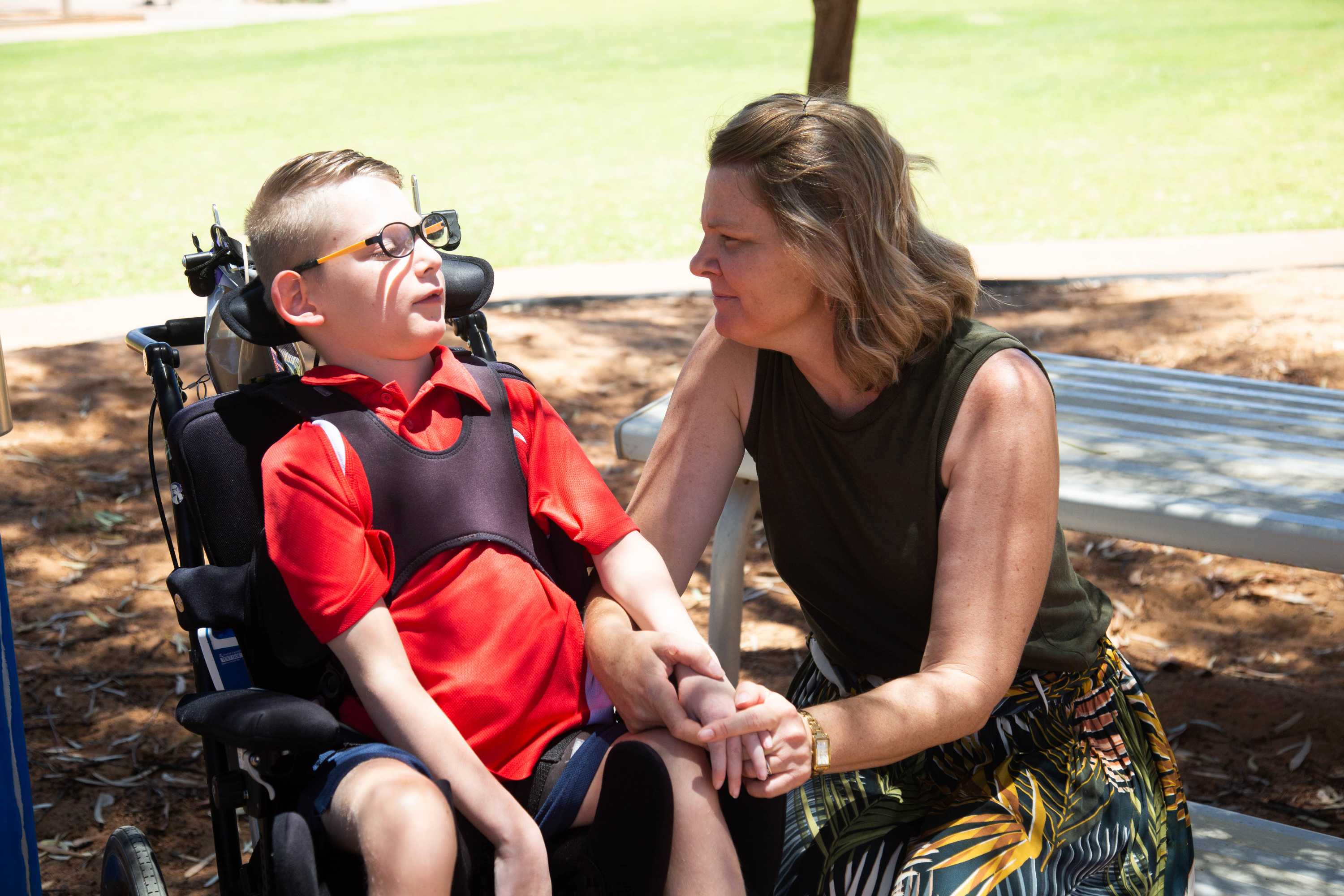 A mum looks into the eyes of her son.