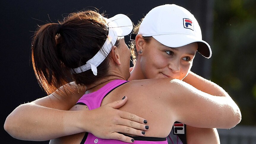 Australia's Casey Dellacqua (L) and Ashleigh Barty (R) celebrate a win at the Australian Open.