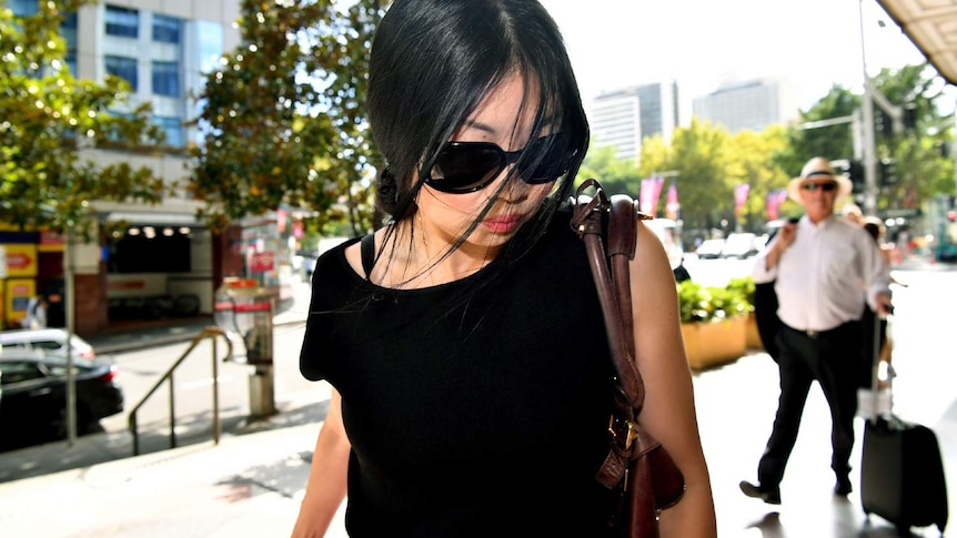 A woman wearing sunglasses