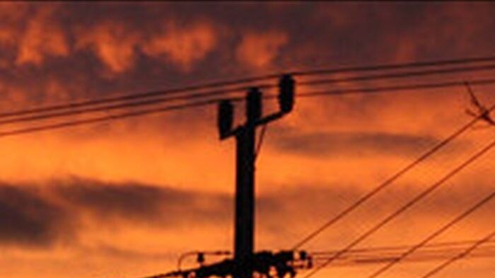 Electricity poles in the sunset.