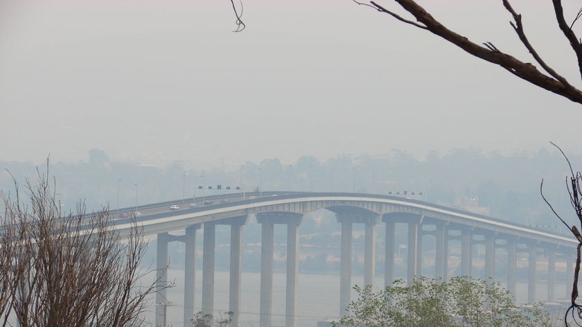 The Tasmanian fire service is urging people not to be panicked by the smoke haze covering much of southern Tasmania