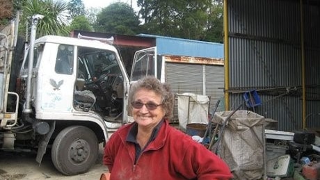 Maria Jackson smiling at her scrap metal yard in Foster