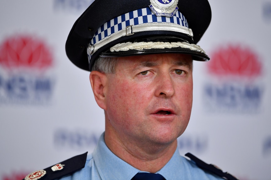 Deputy Commissioner Mick Willing talks to media