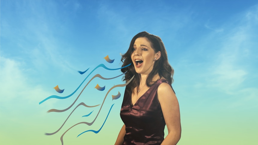 A brunette woman singing in front of a blue sky.