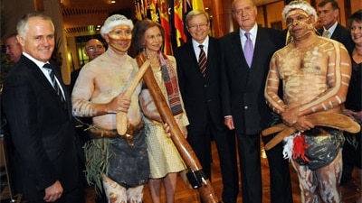 Malcolm Turnbull (left) with Kevin Rudd and Aboriginal dancers at a reception last month for the King and Queen of Spain