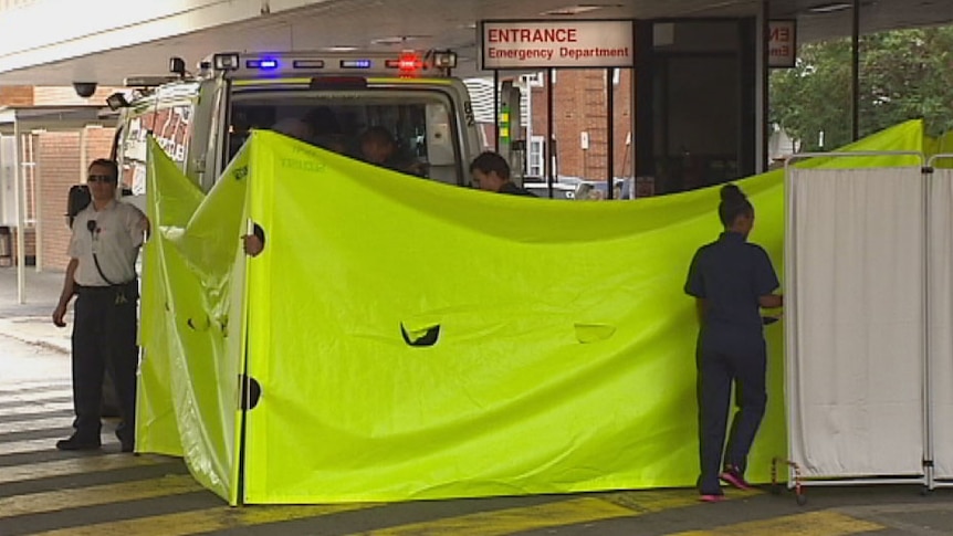 An injured pedestrian is taken to Royal Perth Hospital