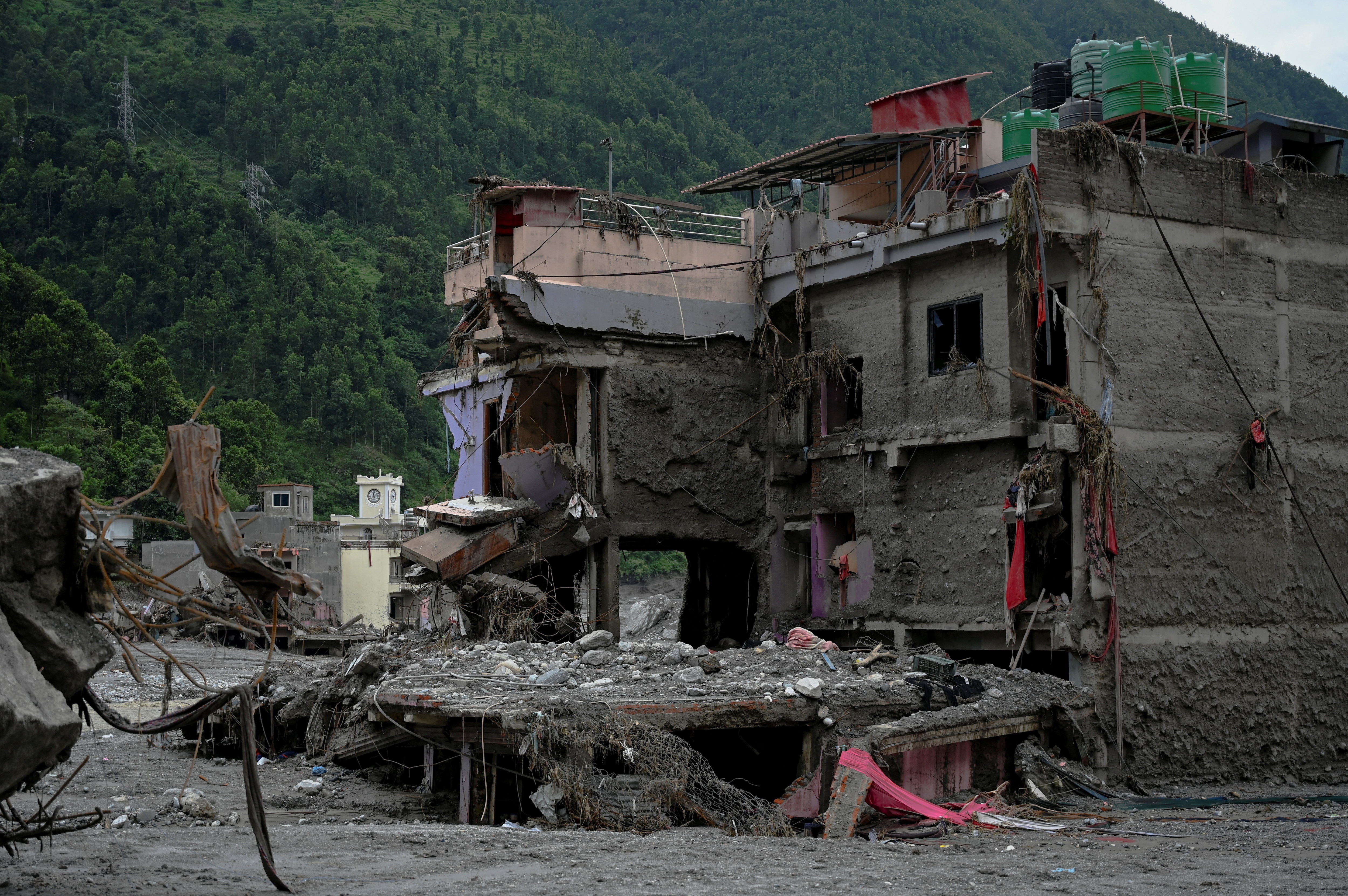 Australian missing in Nepal-Tibet floods found alive