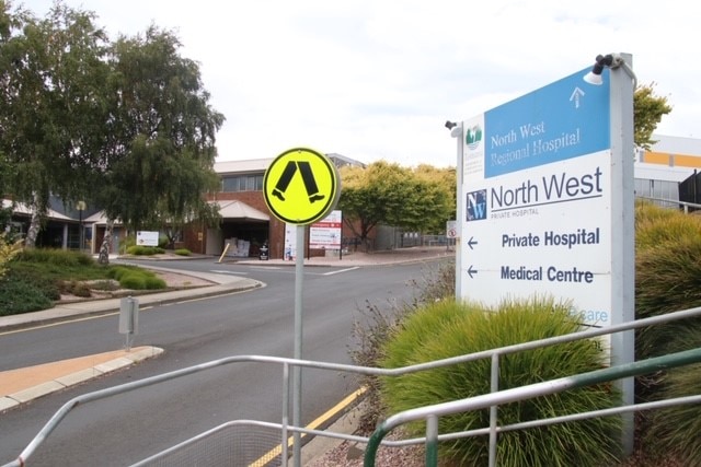 The entrance to the North West Regional Hospital and North West Private Hospital, with a sign pointing to the buildings.