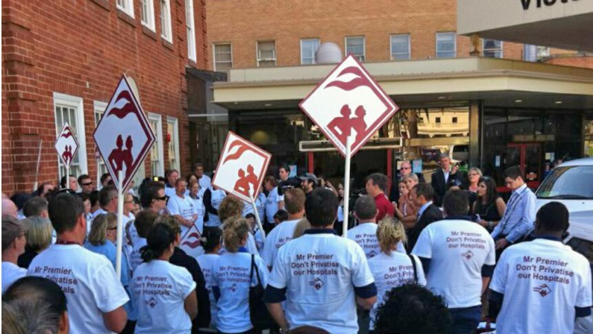 The group is holding a stop-work meeting outside RPH