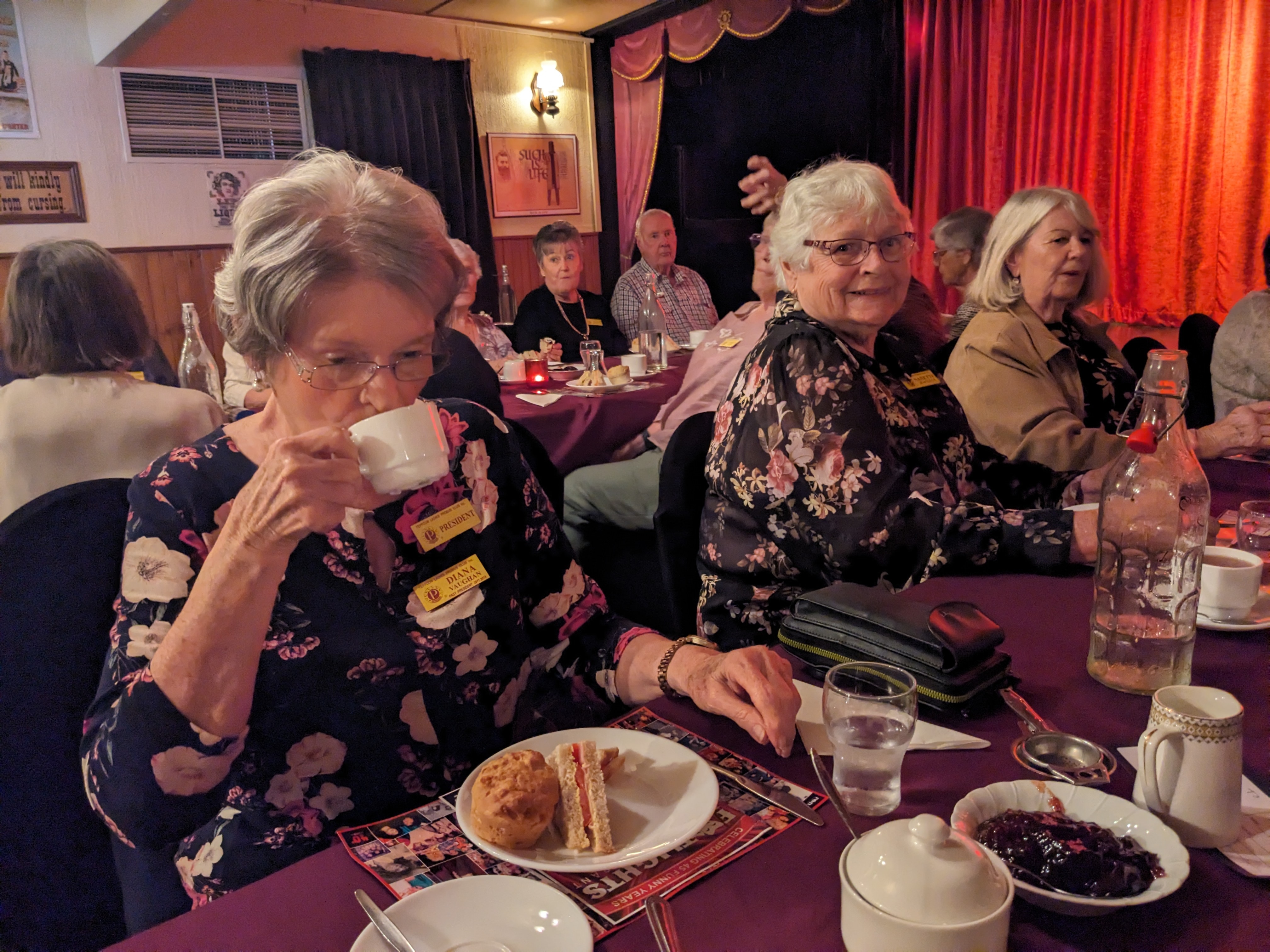 TR sipping tea