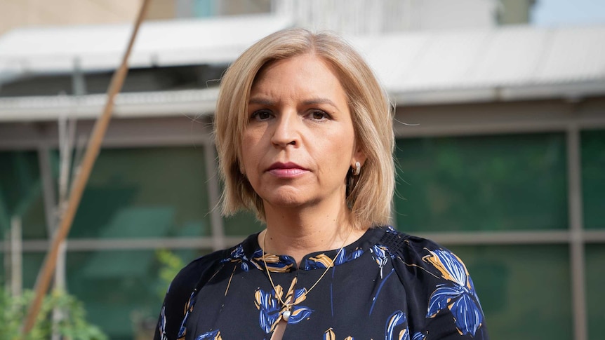 Human rights lawyer and academic Dr Hannah McGlade stands in a garden