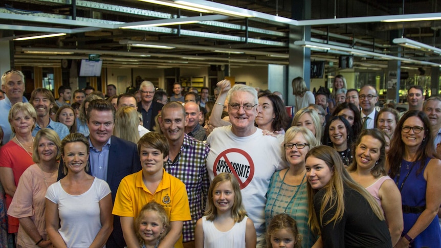 Eoin Cameron surrounded by his family and ABC colleagues, March 11, 2016.